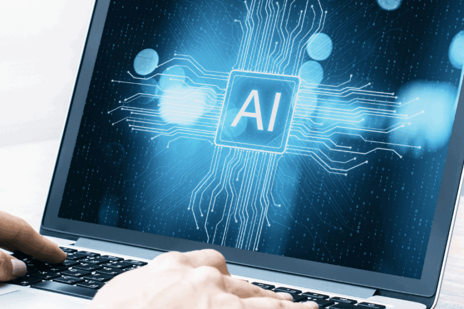 Computador com IA na tela representando o uso da inteligência artificial em golpes online.